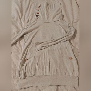 Cowl neck top. Button detail